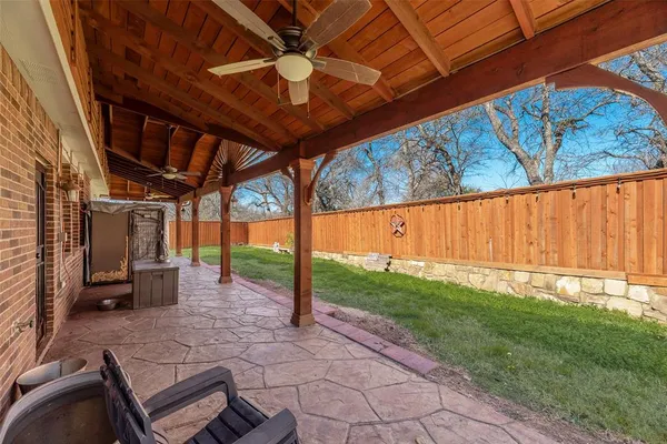 a view of a backyard with garden