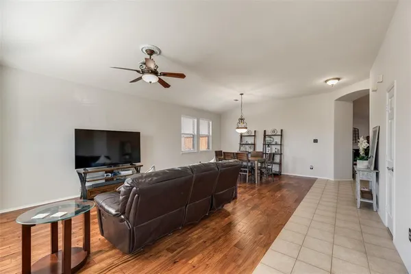 a kitchen with stainless steel appliances granite countertop a stove refrigerator sink and cabinets