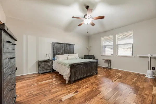 a bathroom with a bathtub and toilet