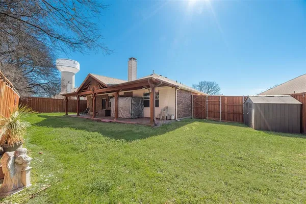 aerial view of a house with outdoor space