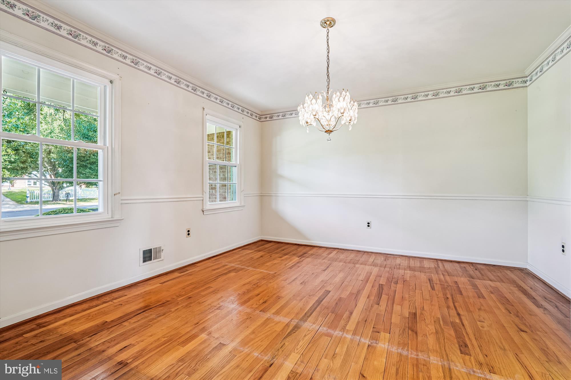 13708 Turnmore Road Silver Spring, MD 20906 - Photo 21 of 65 a view of empty room with wooden floor and fan
