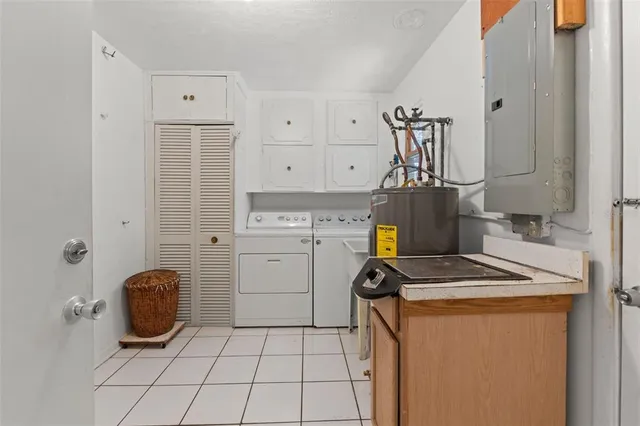 a storage room with washer and dryer