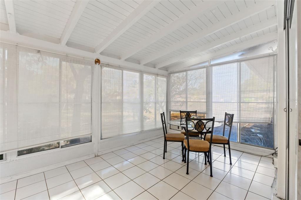 7222 Holiday Drive Spring Hill, FL 34606 - Photo 27 of 50 a dining room with furniture and window
