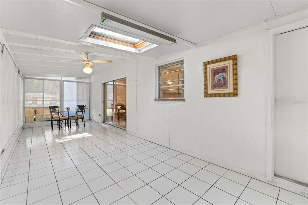 7222 Holiday Drive Spring Hill, FL 34606 - Photo 30 of 50 a view of a livingroom with furniture and a dinning area