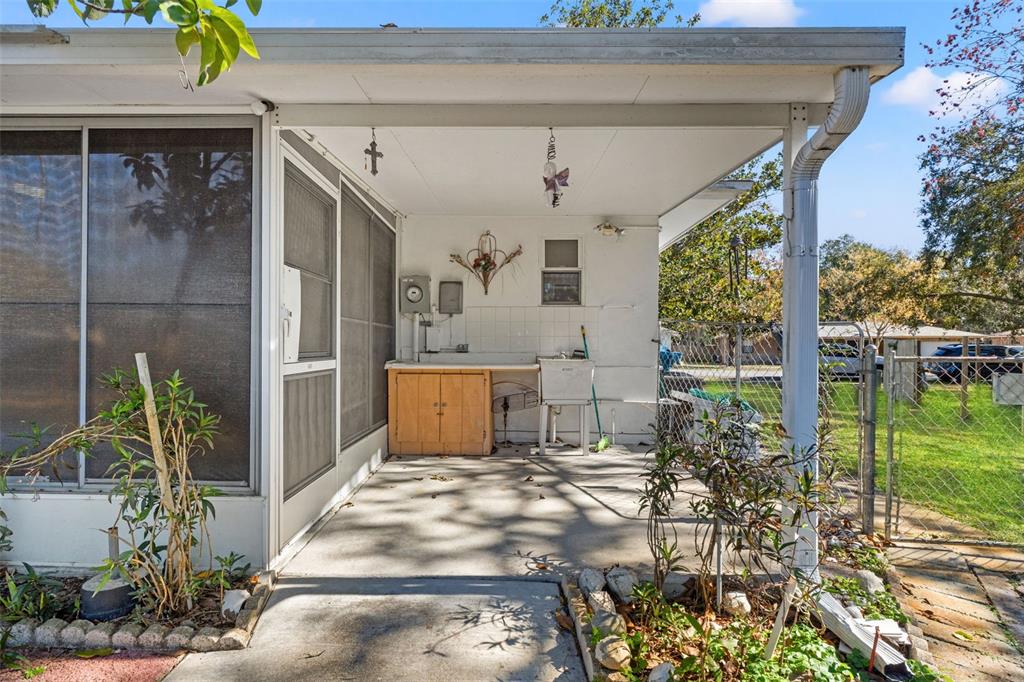 7222 Holiday Drive Spring Hill, FL 34606 - Photo 34 of 50 a view of a living room and outdoor space