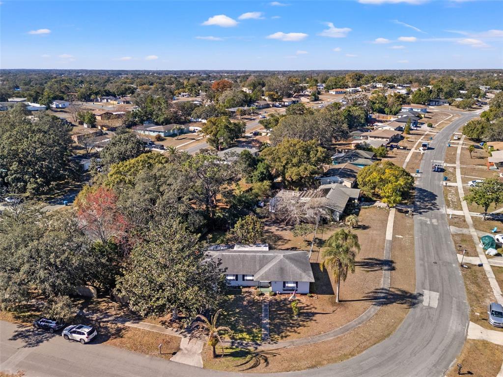 7222 Holiday Drive Spring Hill, FL 34606 - Photo 44 of 50 an aerial view of residential houses with outdoor space
