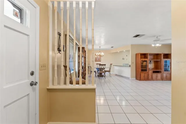 a view of a living room and entry way