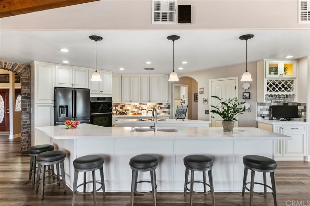 38345 Chaparral Drive Temecula, CA 92592 - Photo 11 of 43 a living room with furniture and a flat screen tv