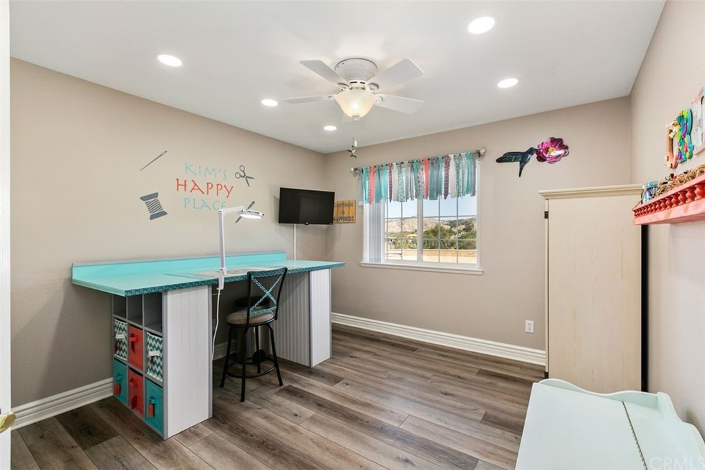 38345 Chaparral Drive Temecula, CA 92592 - Photo 15 of 43 a dining room with furniture large windows and a fireplace