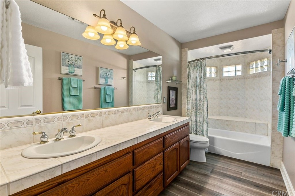 38345 Chaparral Drive Temecula, CA 92592 - Photo 16 of 43 a view of a workspace with furniture and a window