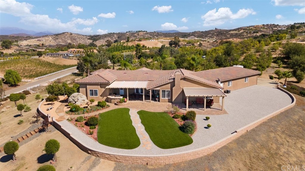 38345 Chaparral Drive Temecula, CA 92592 - Photo 3 of 43 an aerial view of a house