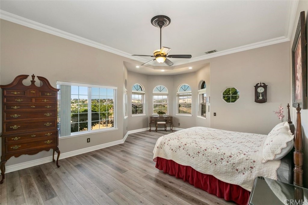 38345 Chaparral Drive Temecula, CA 92592 - Photo 21 of 43 a white toilet sitting next to a bathroom sink