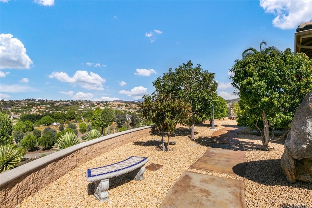38345 Chaparral Drive Temecula, CA 92592 - Photo 31 of 43 a front view of a house with a yard