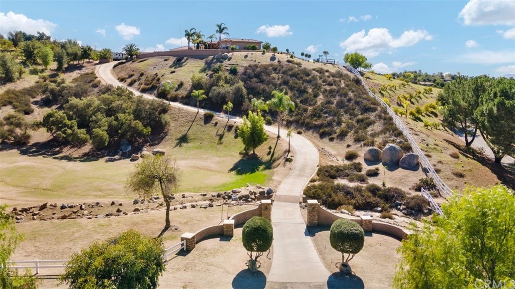 38345 Chaparral Drive Temecula, CA 92592 - Photo 41 of 43 an aerial view of a house with a yard and lake view