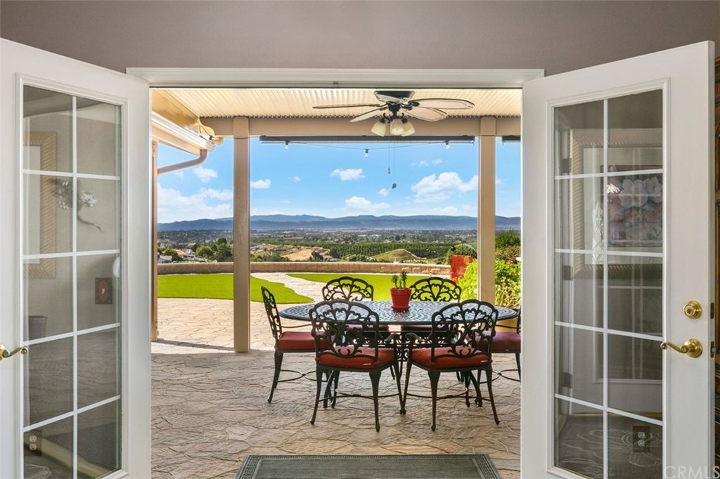 38345 Chaparral Drive Temecula, CA 92592 - Photo 6 of 43 a view of a dining room with furniture water view and wooden floor