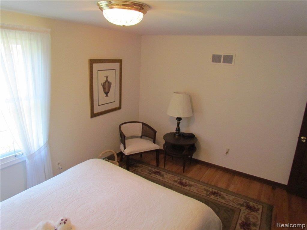 22854 Penton Rise Court Novi, MI 48375 - Photo 17 of 25 Hardwood Floors upstairs