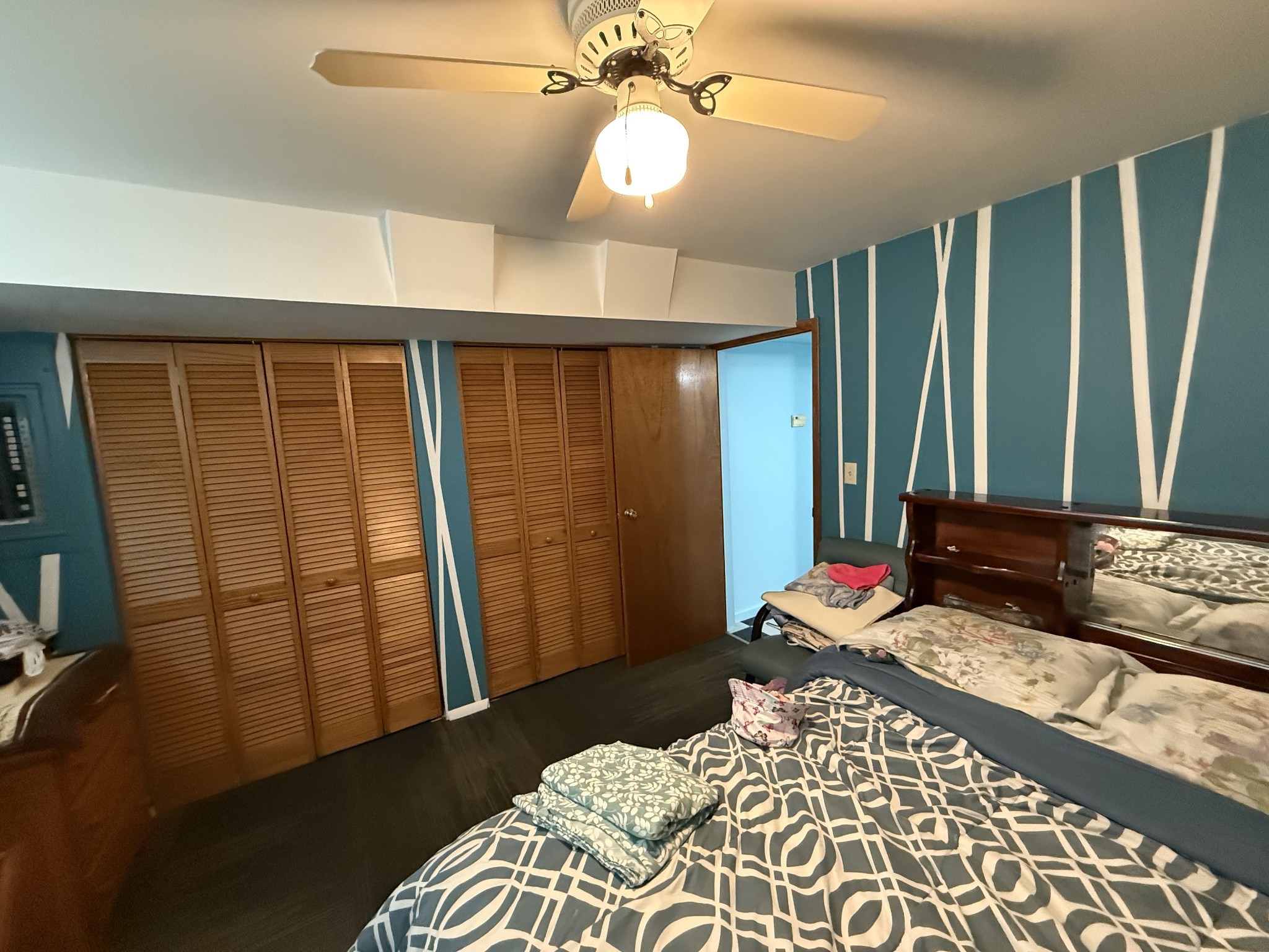 5 Carol Road Summertown, TN 38483 - Photo 14 of 60 a bedroom with a bed and a chandelier