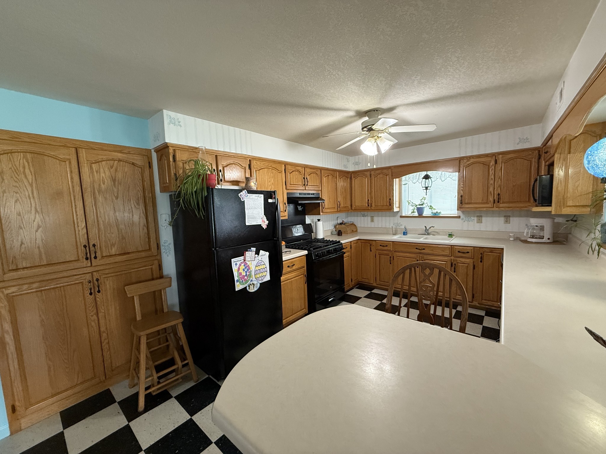 5 Carol Road Summertown, TN 38483 - Photo 18 of 60 a kitchen with stainless steel appliances a refrigerator a sink a stove a microwave and island
