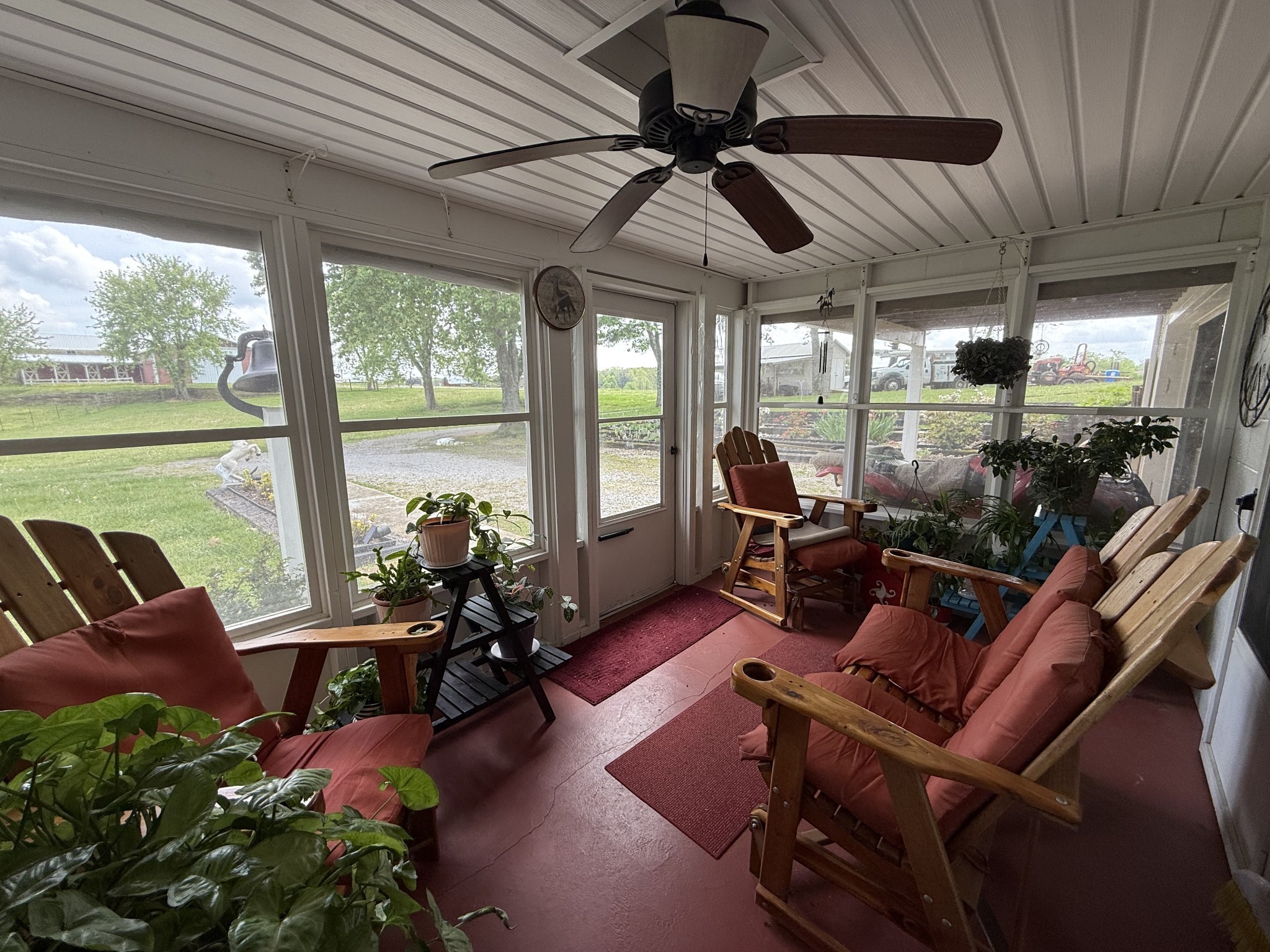 5 Carol Road Summertown, TN 38483 - Photo 21 of 60 a living room with patio furniture and a floor to ceiling window