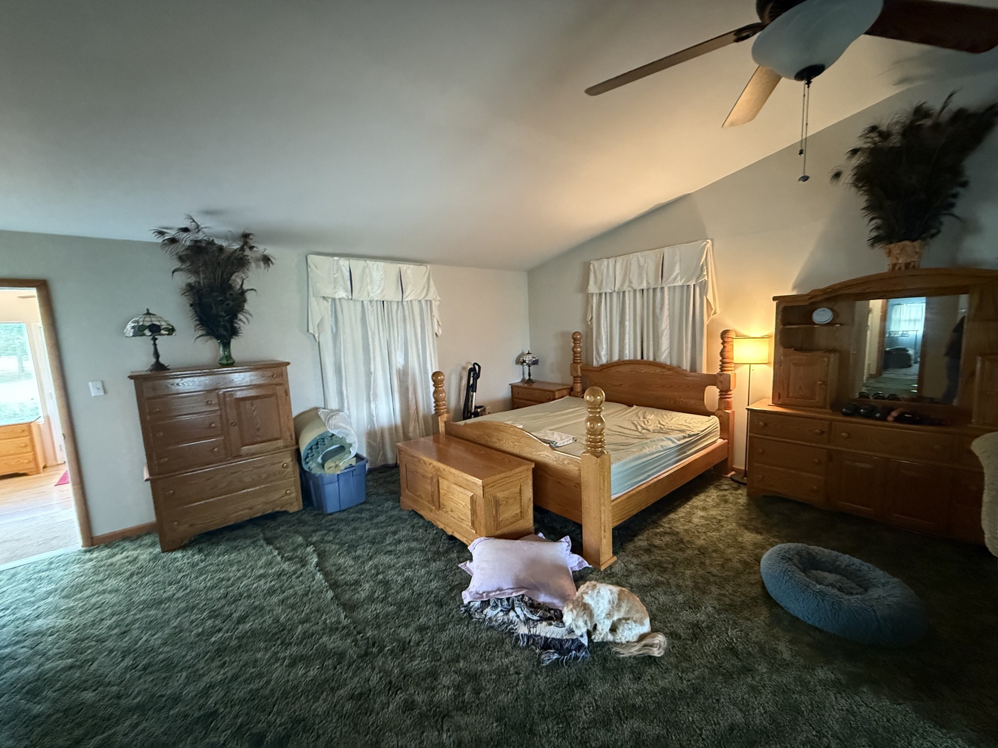 5 Carol Road Summertown, TN 38483 - Photo 30 of 60 a spacious bedroom with a bed and a couch