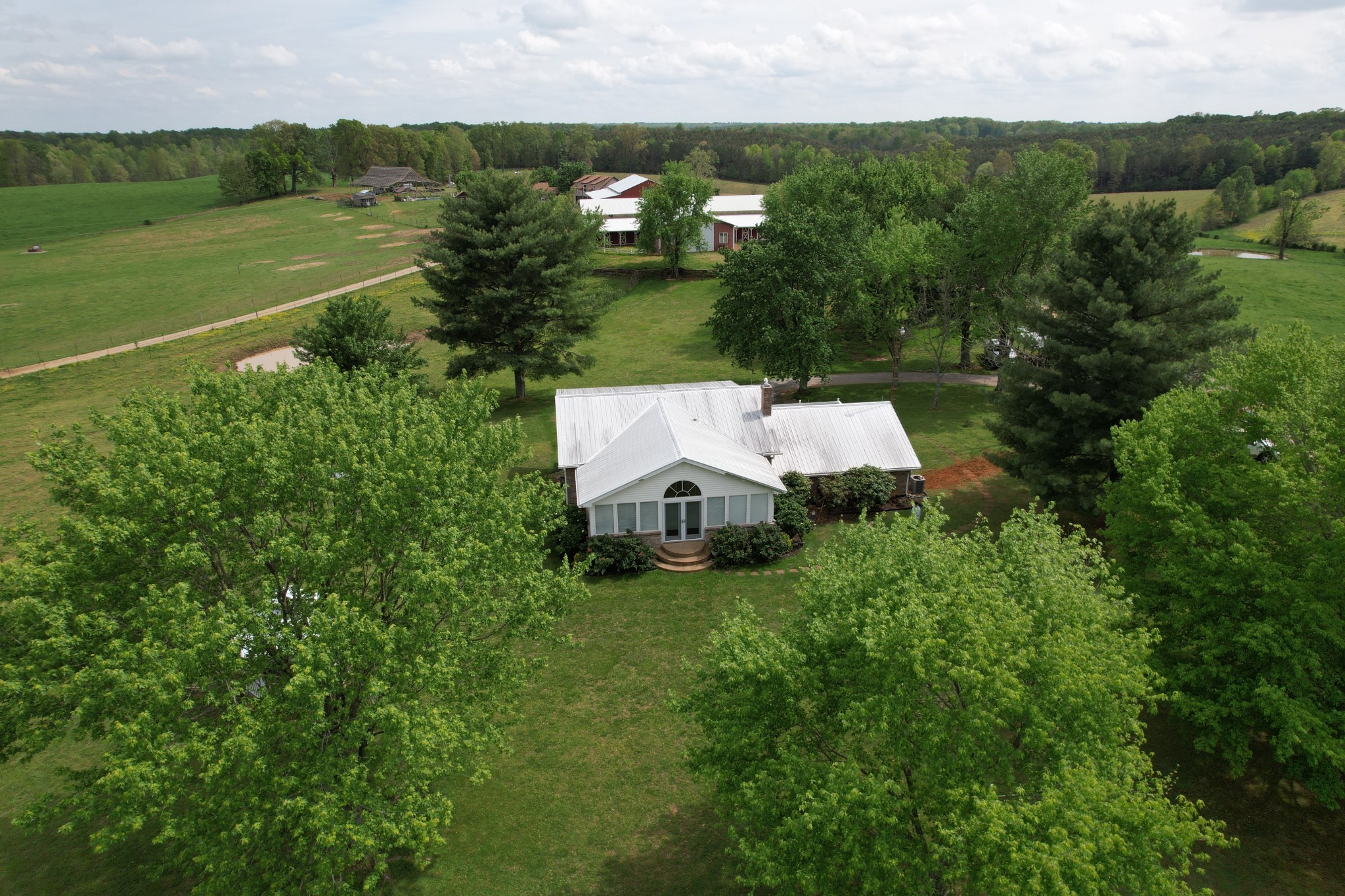 5 Carol Road Summertown, TN 38483 - Photo 35 of 60 an aerial view of a house with a garden and lake view