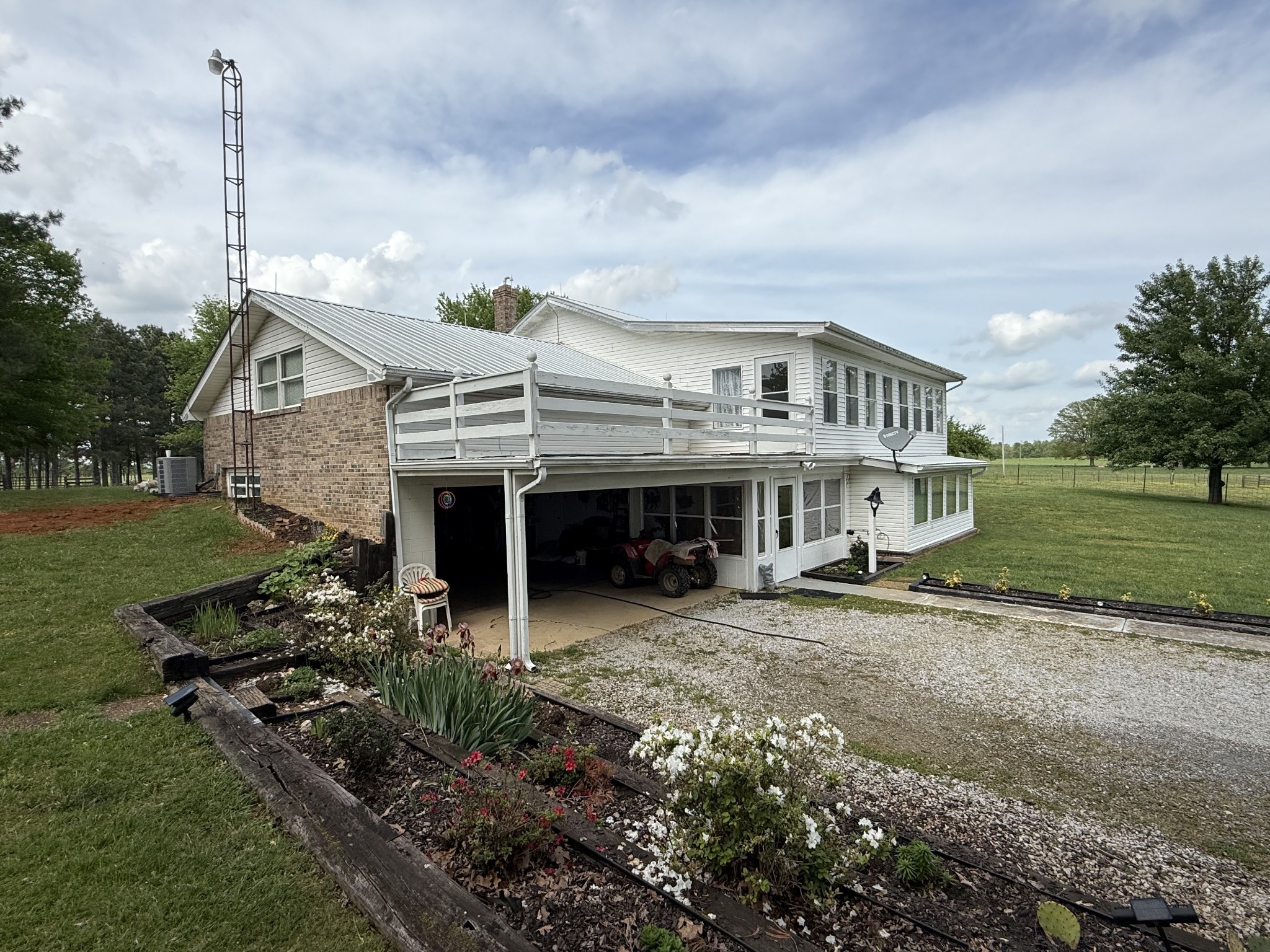5 Carol Road Summertown, TN 38483 - Photo 51 of 60 a view of a house with a big yard and large tree