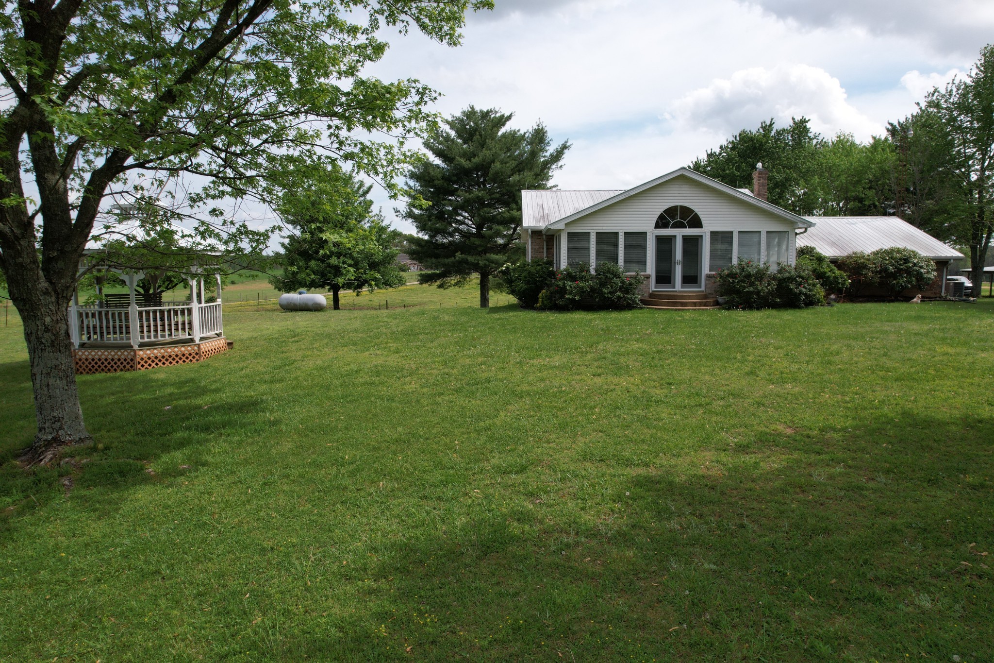 5 Carol Road Summertown, TN 38483 - Photo 7 of 60 a front view of a house with garden