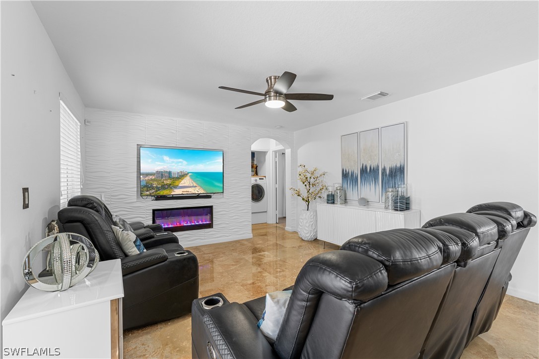 13302 Southwest 283rd Street Homestead, FL 33033 - Photo 12 of 43 a living room with furniture and a flat screen tv