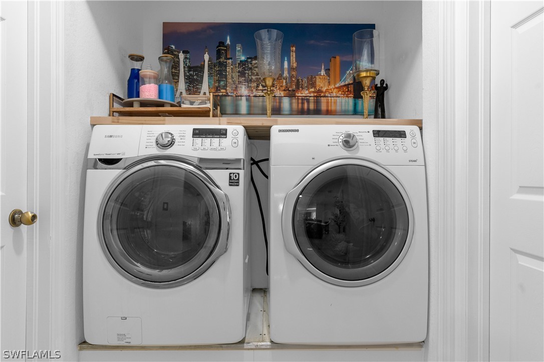 13302 Southwest 283rd Street Homestead, FL 33033 - Photo 17 of 43 a utility room with dryer and washer
