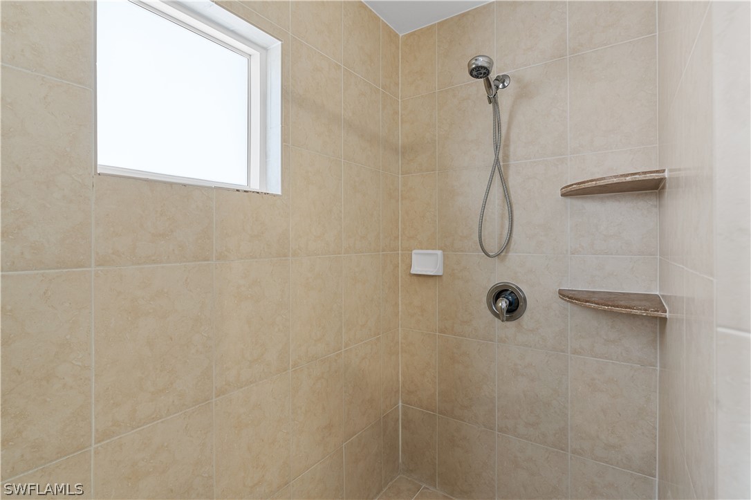 13302 Southwest 283rd Street Homestead, FL 33033 - Photo 34 of 43 a bathroom with a shower