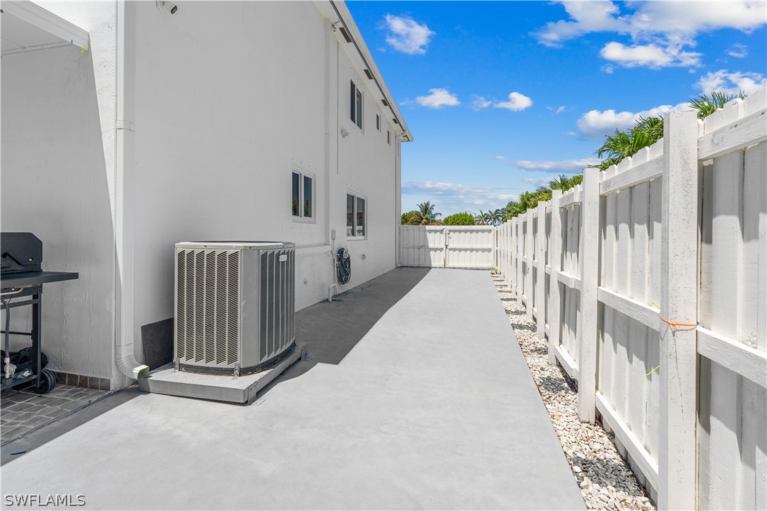 13302 Southwest 283rd Street Homestead, FL 33033 - Photo 39 of 43 a view of a deck front of house with wooden floor
