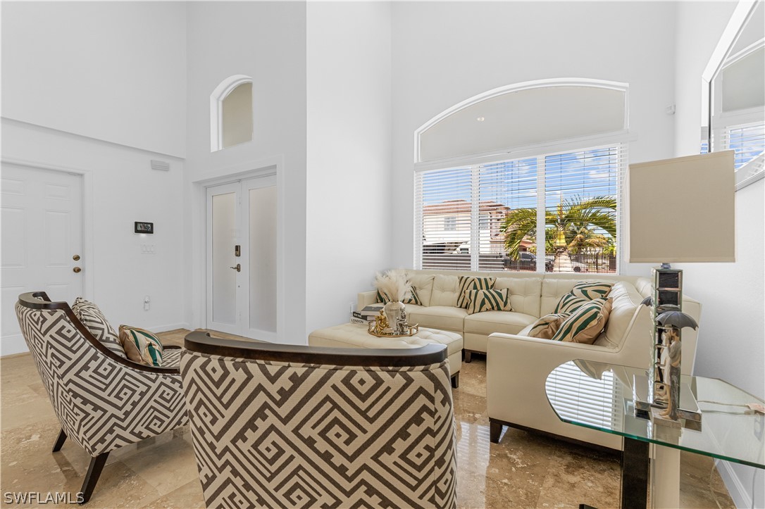 13302 Southwest 283rd Street Homestead, FL 33033 - Photo 9 of 43 a bedroom with furniture and a large window