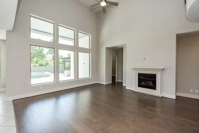 a view of kitchen with kitchen island refrigerator sink and stove