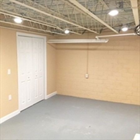 175 Brittany Road Springfield, MA 01151 - Photo 12 of 16 a view of a room with racks on the wall