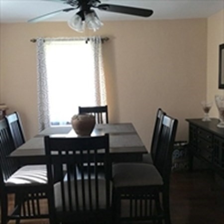175 Brittany Road Springfield, MA 01151 - Photo 7 of 16 a view of a dining room with furniture and chandelier