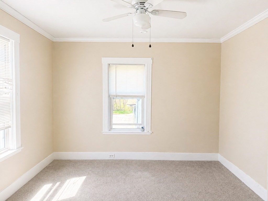97 Plimpton Street Southbridge, MA 01550 - Photo 14 of 19 an empty room with a window