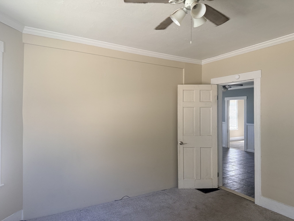97 Plimpton Street Southbridge, MA 01550 - Photo 15 of 19 a view of a room with a chandelier fan
