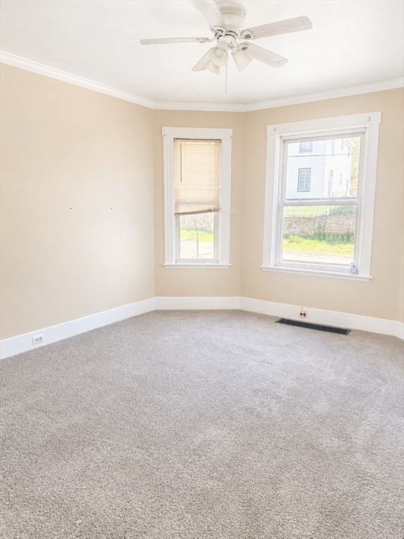 97 Plimpton Street Southbridge, MA 01550 - Photo 16 of 19 an empty room with a window