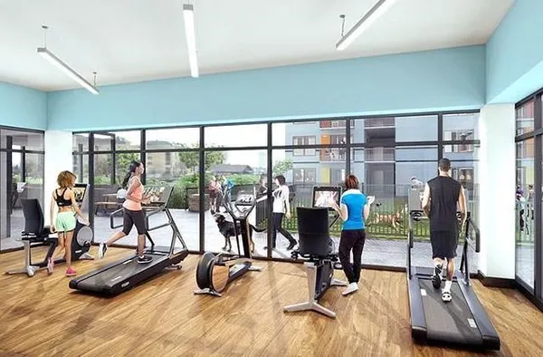 a view of a gym with gym equipment