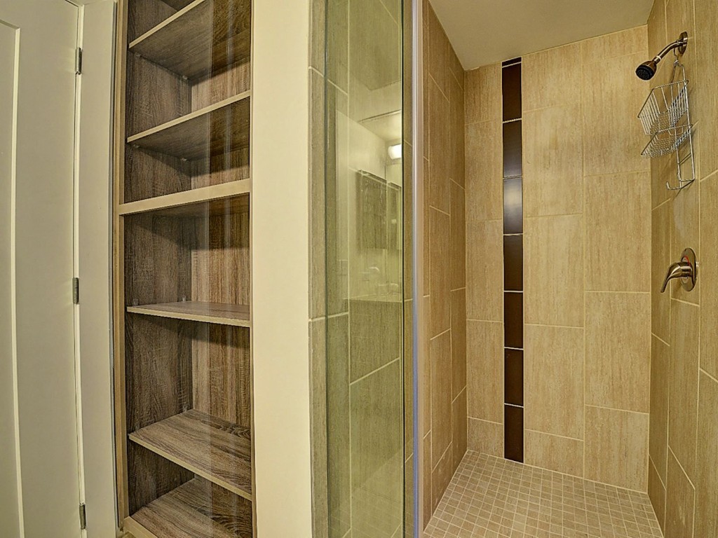 3550 Main Street, Unit 4425 Houston, TX 77002 - Photo 7 of 46 a bathroom with a glass door shower