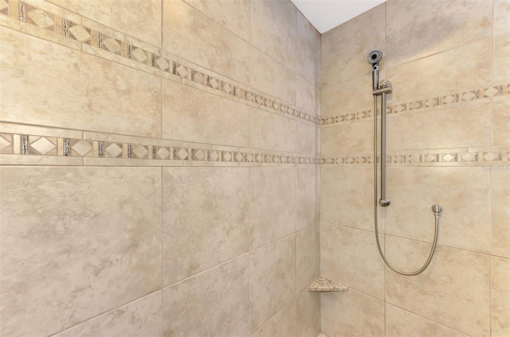 5868 Jefferson Road Venice, FL 34293 - Photo 37 of 68 Oversized Walk-in, zero-step Shower with Rain Head