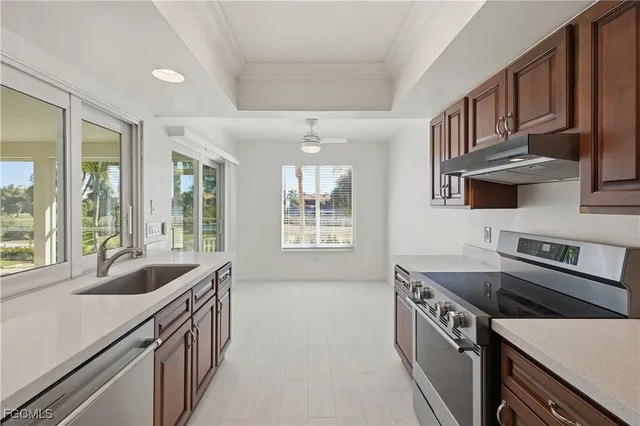 a bathroom with a sink a vanity and a mirror