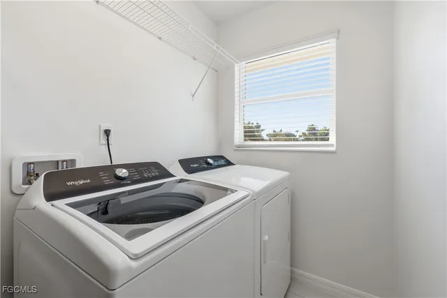 an aerial view of a houses with outdoor space