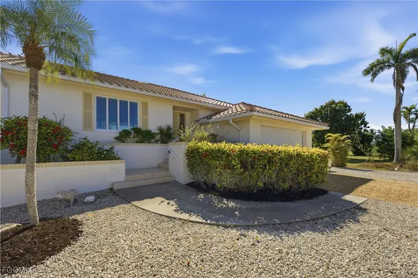 a view of a backyard of house