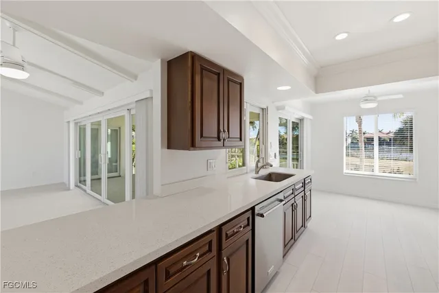 a kitchen with a stove and a refrigerator