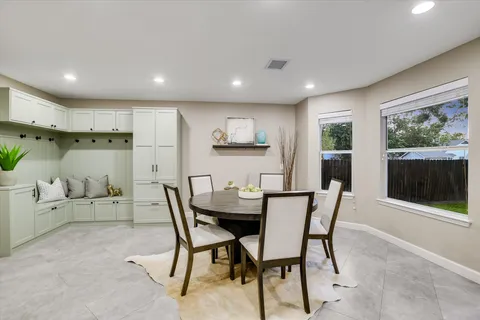 a view of a dining room with furniture