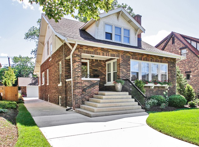 7 Wisner Street Park Ridge, IL 60068 - Photo 1 of 20 a front view of house with yard and green space