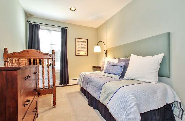 7 Wisner Street Park Ridge, IL 60068 - Photo 12 of 20 a bedroom with a bed and a window