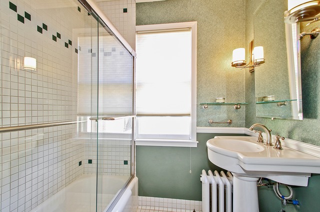7 Wisner Street Park Ridge, IL 60068 - Photo 13 of 20 a bathroom with a sink and a mirror