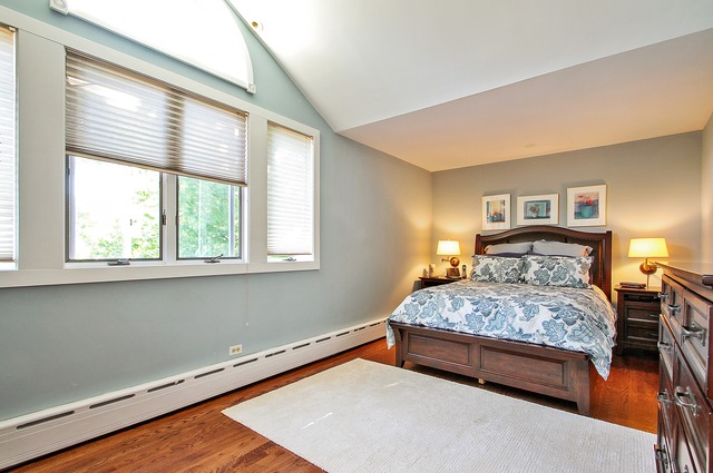 7 Wisner Street Park Ridge, IL 60068 - Photo 10 of 20 a bedroom with a large bed and a large window